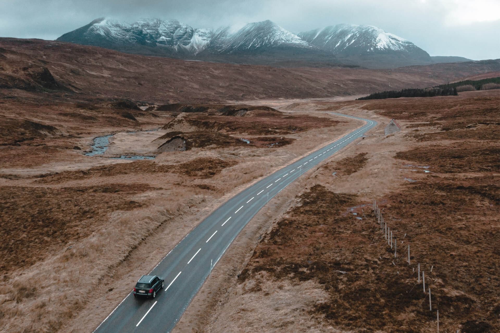 Car on a country road from above