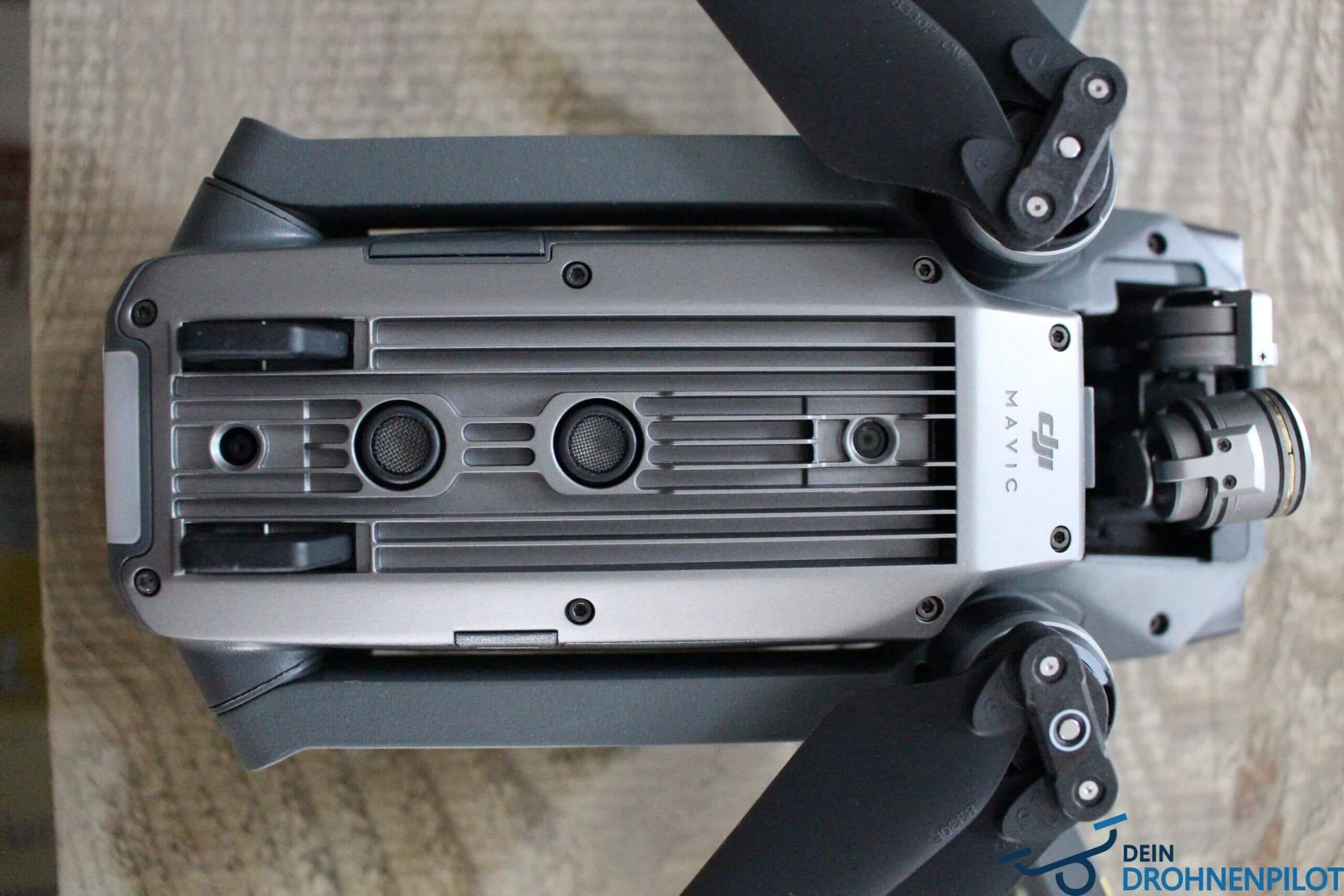 DJI Mavic Pro drone cleaning sensors on the underside